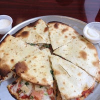 Photo taken at Milano&amp;#39;s Pizzeria &amp;amp; Italian Grill by Gladys W. on 6/19/2012