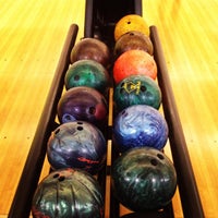 Photo taken at Planet Bowling by Henrique D. on 8/12/2012