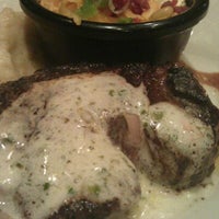 Photo taken at Black Angus Steakhouse by Emily S. on 5/19/2012