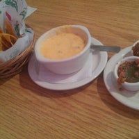 Photo taken at Con Queso Restaurant and Bar by Chelsea T. on 4/8/2012