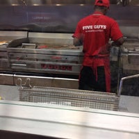 Photo taken at Five Guys by Tiffany B. on 7/19/2012