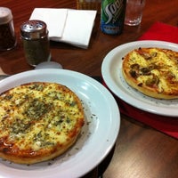 Photo taken at Super Pizza Pan by Renato F. on 3/11/2012