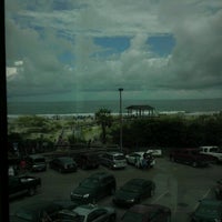 Photo taken at Dolphin Reef Oceanfront Restraurant by Zachery R. on 7/15/2012