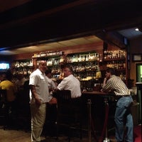 Photo taken at Downing Street Pub &amp; Cigar Bar by Leprechaun Cider Company on 8/18/2012