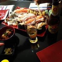 Photo taken at Flying Sushi by Marcos S. on 5/6/2012