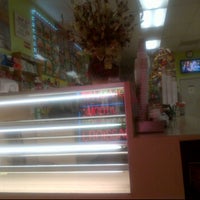 Photo taken at Rainbow Donuts by Maria A. on 6/7/2012