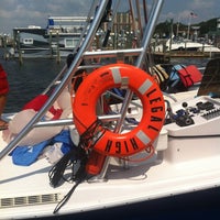 Photo taken at Dockside Watersports &amp;amp; Parasailing by Paula K. on 7/5/2012