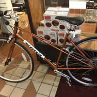 Photo taken at Alternative Bike &amp;amp; Board Shop by Adriane M. on 3/30/2012