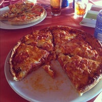 Foto diambil di Roys Pizza &amp; Indian Tandoori oleh German C. pada 9/7/2012