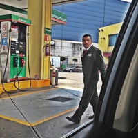 Photo taken at Gasolinería by Cesar M. on 3/18/2012