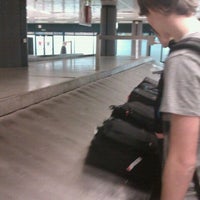 Photo taken at Baggage Claim by Claudio M. on 3/25/2012