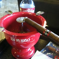 Photo taken at En Fuego Cigars &amp;amp; Lounge by Brian K. on 8/8/2012