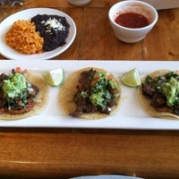 Photo taken at El Molcajete Mexican Cocina by Sam O. on 3/28/2012