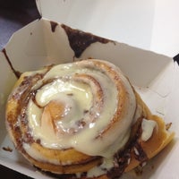 Photo taken at Cinnabon by Isabella R. on 7/3/2012