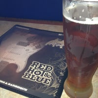 Photo taken at Red Hot &amp; Blue Herndon by Andrew G. on 5/1/2012