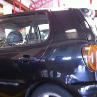Photo taken at Kwik-Fit by Edith V. on 8/26/2012