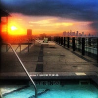 Photo taken at The Mercury Rooftop Pool by Flip L. on 8/17/2012
