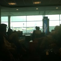 Photo taken at Gate B25 by Dave W. on 8/19/2012