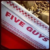 Photo taken at Five Guys by Alexandre V. on 3/30/2012