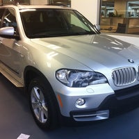 Photo taken at Momentum BMW by Robyn M. on 8/18/2012