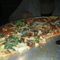 Photo taken at Bad Horse Pizza by Alandis B. on 3/25/2012