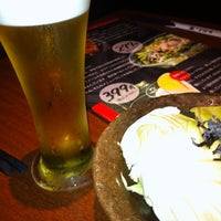 Photo taken at 炭火焼だいにんぐ わたみん家 藤沢南口店 by Kazuaki O. on 6/8/2012