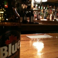Photo taken at Sit-N-Bull Pub by Laura L. on 4/11/2012