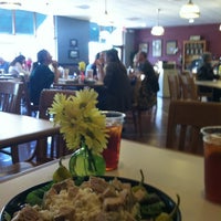 Photo taken at Rising High Cafe by Liza F. on 3/27/2012