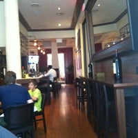 Photo taken at The Strand Bistro by Neal F. on 8/5/2012