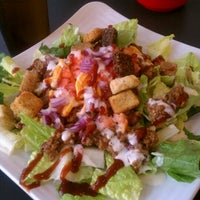 Photo taken at Muscle Maker Grill by Brandon V. on 7/17/2012