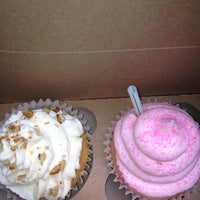 Photo taken at Holly&amp;#39;s Cupcake Shop by Tiffany D. on 5/4/2012