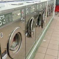 Photo taken at 24 Hour Laundry Colosseum by Jerk J. on 7/4/2012