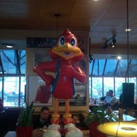 Photo taken at Red Robin Gourmet Burgers and Brews by Johnny S. on 4/21/2012