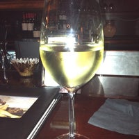 Photo taken at Absolve Wine Lounge by Ashley J. on 7/13/2012