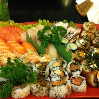 Photo taken at Flying Sushi by Flora R. on 6/17/2012