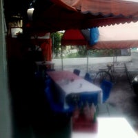 Photo taken at El Rincon Gourmet by Pedro A. on 7/4/2012