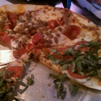 Photo taken at Mangia Pizza by Ashley C. on 2/20/2012