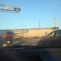 Photo taken at Railroad Crossing - New York &amp; Pine by India W. on 5/25/2012