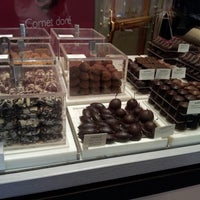 Photo taken at Neuhaus Chocolatier by a r. on 9/11/2012