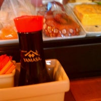 Photo taken at iSushi Cafe by Leah S. on 6/13/2012