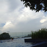 Photo taken at 8th Floor Rooftop Swimming Pool @ Changi Village Hotel by aHHwee L. on 7/7/2012