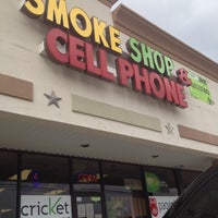 Photo taken at A dollar 9 store plus cellphone and more and smoke shop by Gladys W. on 4/2/2012