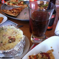 Photo taken at Aldi Pizza by Ada V. on 2/21/2012