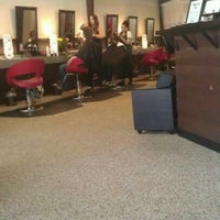 Photo taken at Jungle Red Salon by James A. on 4/14/2012