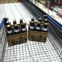 Photo taken at Woodman&amp;#39;s Liquor Store by Roger H. on 8/5/2012