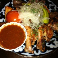 Photo taken at SamarQand Restaurant and Bar by A.A. K. on 4/25/2012