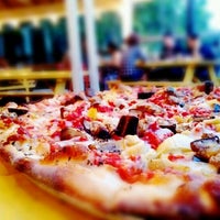Photo taken at Salvation Pizza - 34th Street by Jin C. on 5/29/2012