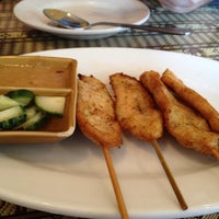 Photo taken at Jasmine Thai Restaurant by Emily S. on 6/6/2012
