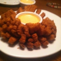 Photo taken at Outback Steakhouse by Ashley on 7/29/2012