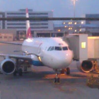 Photo taken at Gate D63 by Georg N. on 3/24/2012